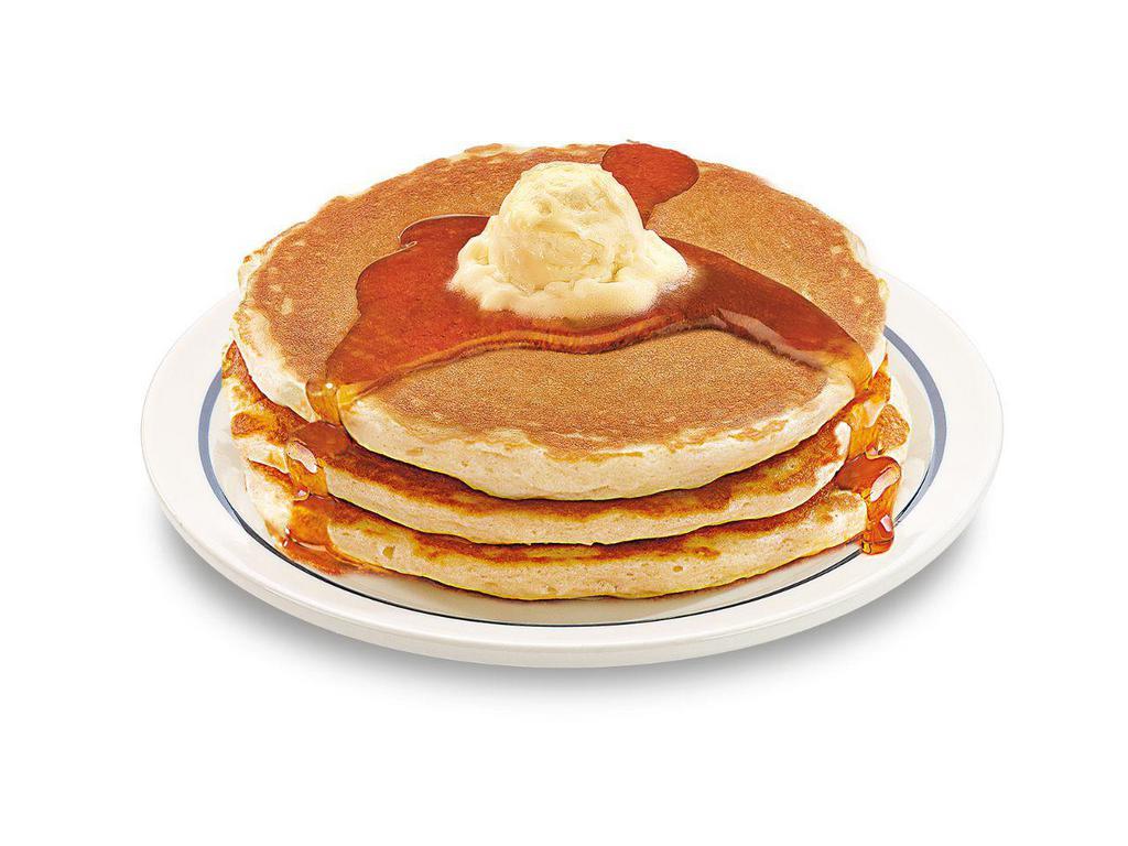 55+ Buttermilk Pancakes · Three fluffy world-famous buttermilk pancakes topped with whipped real butter.

