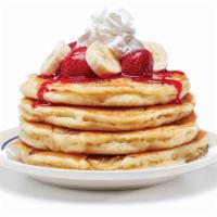 Strawberry Banana Pancakes · Little known fact: Strawberries and Bananas are best friends. Four fluffy buttermilk pancake...