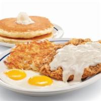 Country Fried Steak & Eggs · Golden-battered beef steak smothered in hearty gravy. Served with 2 eggs* your way, golden h...