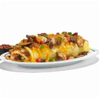 Big Steak Omelette · Your hunger won’t be at steak with this one. Our omelette stuffed with steak, hash browns, g...