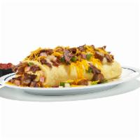 Colorado Omelette · Experience the Rocky Mountain lifestyle with our omelette stuffed with bacon, shredded beef,...
