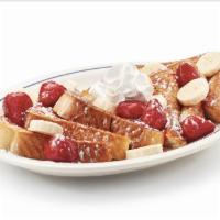 Strawberry Banana French Toast · Our original thick-cut French toast topped with glazed strawberries & fresh banana slices, d...