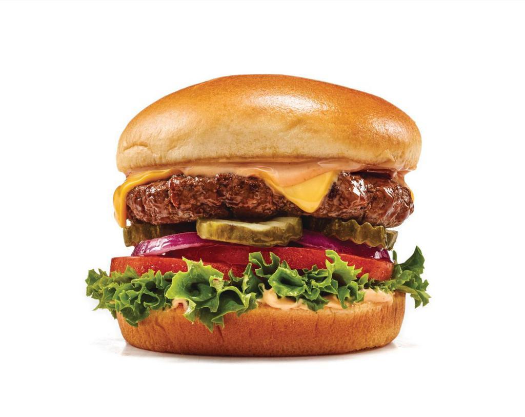 The Classic Burger · Truly a classic. American cheese, lettuce, tomato, red onion, pickles & IHOP® Sauce.

