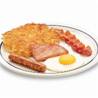 55+ Breakfast Sampler · One egg* your way, 1 bacon strip, 1 pork sausage link, 1 thick-cut piece of ham & hash browns.