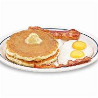 55+ 2 x 2 x 2 · Two buttermilk pancakes, 2 eggs* your way & 2 bacon strips or 2 pork sausage links.

