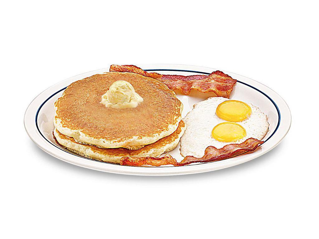 55+ 2 x 2 x 2 · Two buttermilk pancakes, 2 eggs* your way & 2 bacon strips or 2 pork sausage links.

