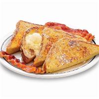 55+ French Toast · Four triangles served with 2 bacon strips or 2 pork sausage links.

