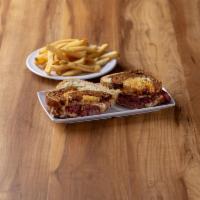 Reuben Sandwich · Grilled lean corned beef with sauerkraut, melted Swiss cheese and Thousand Island dressing o...