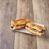 Regular Philly Cheesesteak Sub · 8 oz. of steak, grilled onions, American cheese and mayo.