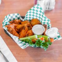 Buffalo Wings · 12 pieces. Hot, sweet chili, BBQ. Served with celery strips. Ranch, blue cheese dressing.