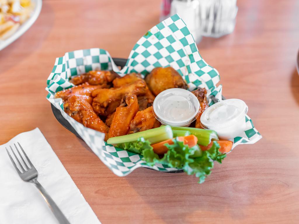 Buffalo Wings · 12 pieces. Hot, sweet chili, BBQ. Served with celery strips. Ranch, blue cheese dressing.