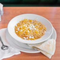 Cup of Green Chili  · Served with 1 warm and fresh flour tortilla.