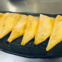 6 Crab Rangoon · Fried wonton wrapper filled with crab and cream cheese.