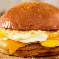Egg and Cheese Sandwich · Freshly cracked eggs, aged cheddar cheese, on a toasted brioche bun.