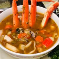 Caldo de Mariscos · Seafood soup with crab legs, fish, shrimp, mussels and jalapenos. Served with 2 tortillas or...