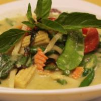 24. Green Curry  · Choice of beef, chicken, or pork in a green curry coconut milk broth with eggplant, bamboo s...