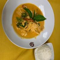 25. Panang Curry  · Choice of beef, chicken, or pork simmered in a red creamy curry peanut sauce, coconut milk, ...