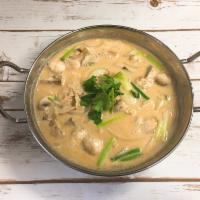 12. Tom Ka Soup · Thai style coconut soup with mushrooms, onions, tomatoes, and lemon grass with choice of chi...
