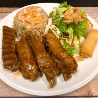 56. House BBQ Pork Spare Rib · Thai BBQ pork spare rib served with shrimp fried rice, green salad and vegetable egg roll.