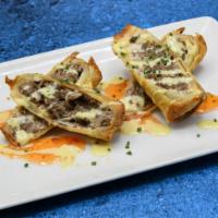 Cheesesteak Eggrolls · Sweet & spicy chili sauce, honey mustard (2 eggrolls).