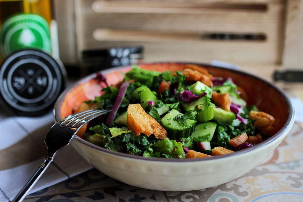 Peasant Fattoush Salad Bowl · Romaine, kale, red cabbage, tomatoes, celery, cucumber and herbs, served with Zataar vinaigrette dressing.