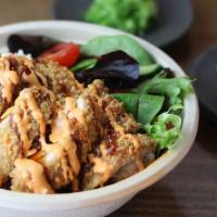 Crispy Shoyu Chicken · Our delicious crispy shoyu chicken bowl comes with rice, cucumbers, a bed of mixed greens an...
