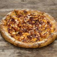 Funky Q. Chicken Pie · BBQ chicken, mozzarella, cheddar, caramelized onions and applewood smoked bacon. Finished wi...