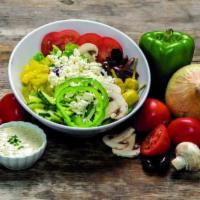 Greek Salad (Full Size) · Romaine and iceberg lettuce, shredded carrots, red cabbage, onions, cucumbers, green peppers...