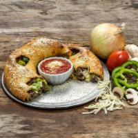 Steak and Cheese Calzone · Grilled, shaved all natural ribeye steak with mushrooms, onions, green peppers, seasoned ric...