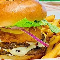 American Burger · Served on brioche bun with lettuce, tomato, caramelized onion, onion rings, gherkin, swiss c...