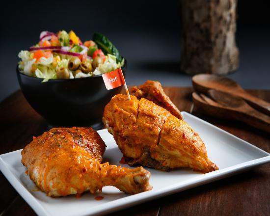 1/2 Chicken · All natural, hormone free, and grass fed. Chicken is marinated  for 24 hours before being slow cooked over an open flame grill in our famous Peri Peri sauces. 