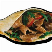 Lamb Gyro · Shredded lamb gyro served in Donner Kebab style pocket pita with salad, tomatoes, onions, an...