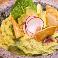 Guacamole with Chips · Ripe avocado, fresh lime juice, jalapeno, tomato, onion, and cilantro.