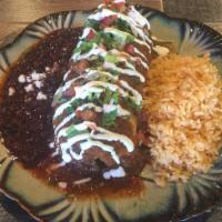 Burritos · Flour tortilla filled with Mexican rice, cheese, black or refried beans. Choose red enchilad...