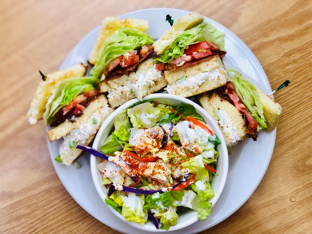 Club Sandwich · Toasted double decker, with chicken salad, lettuce, tomato, bacon on homemade bread, and tossed salad with choice of dressing.