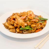 Happy Family · A collection of shrimp, scallops and sliced chicken sauteed with Chinese vegetables in our c...