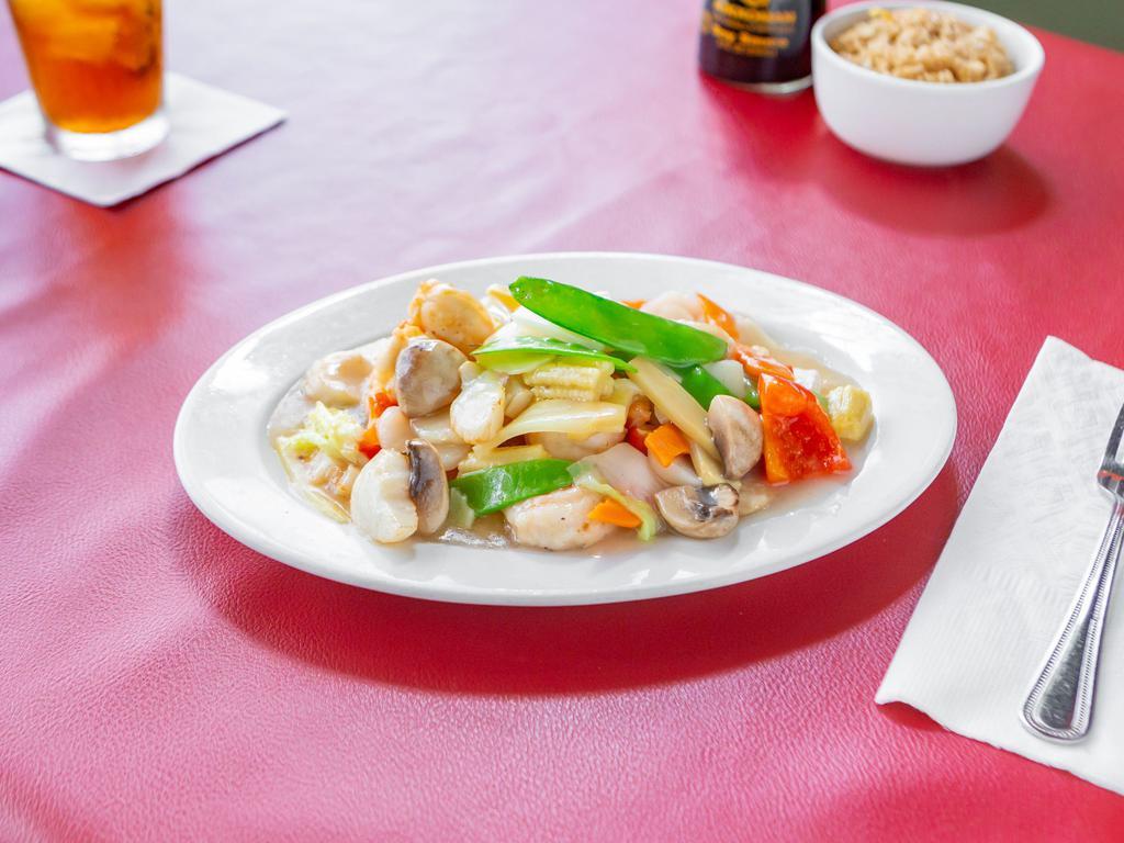 Seafood Delight · Jumbo shrimp, scallops and sauteed with vegetables in a white sauce.