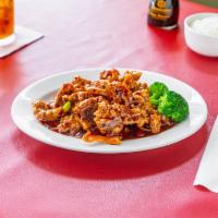 Orange Beef · Crispy beef served in spicy sauce of orange peel and seared red pepper. Spicy.