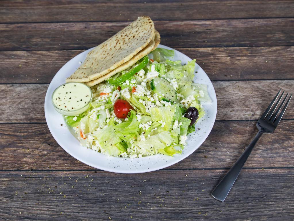 Greek Salad · Comes with lettuce, tomatoes, green peppers, carrots, Greek olives, cucumbers and feta.