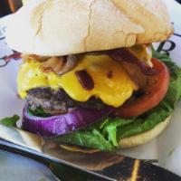 The Porker Burger · Most popular. American cheese, bacon, lettuce, tomato, pickle, and red onion.