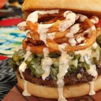 The Fire Burger · Roasted green chilies, sharp cheddar, fried onions, and chipotle ranch.