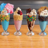 The Carnival Candy · Cotton Candy Syrup, Cotton Candy, White Frosting & Nerds.