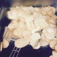 Potato Chips · Our famous hand cut potato chips made fresh to order.