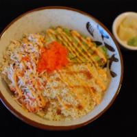 Island Bowl · Sushi rice in the bottom. Topped with crabmeat mix, avocado, crunchy crumb, and masago. Cove...
