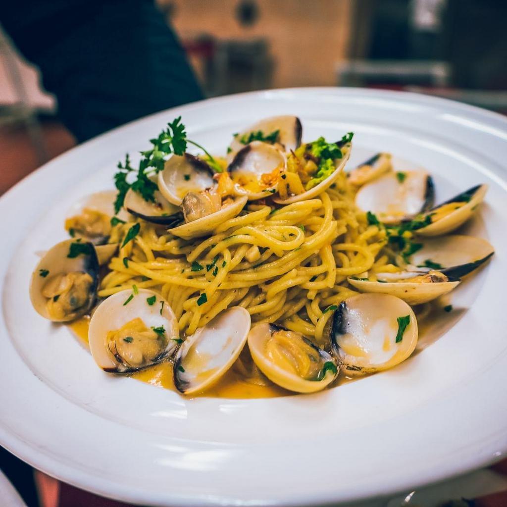 Spaghetti and Clams · Fresh clams and garlic in a white or red sauce.
