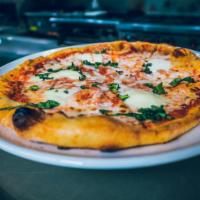 Pizza Margherita · Fresh mozzarella, tomato, and basil