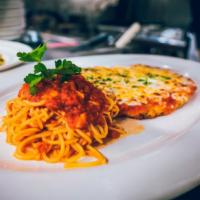 Pollo Parmigiana · Chicken breast baked with Parmigiano cheese, and marinara sauce (side of spaghetti and marin...