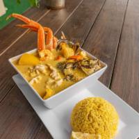 Sopa de Hombre · Coconut seafood soup made with shrimp, fish, conch, crab legs, mussels, green banana, planta...