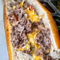 Philly Cheese Steak · Served with peppers, onions. Served with french fries.