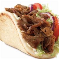 Beef Gyro · Beef slices with chopped lettuce, tomato, onion, and tzatziki sauce wrapped in a pita served...